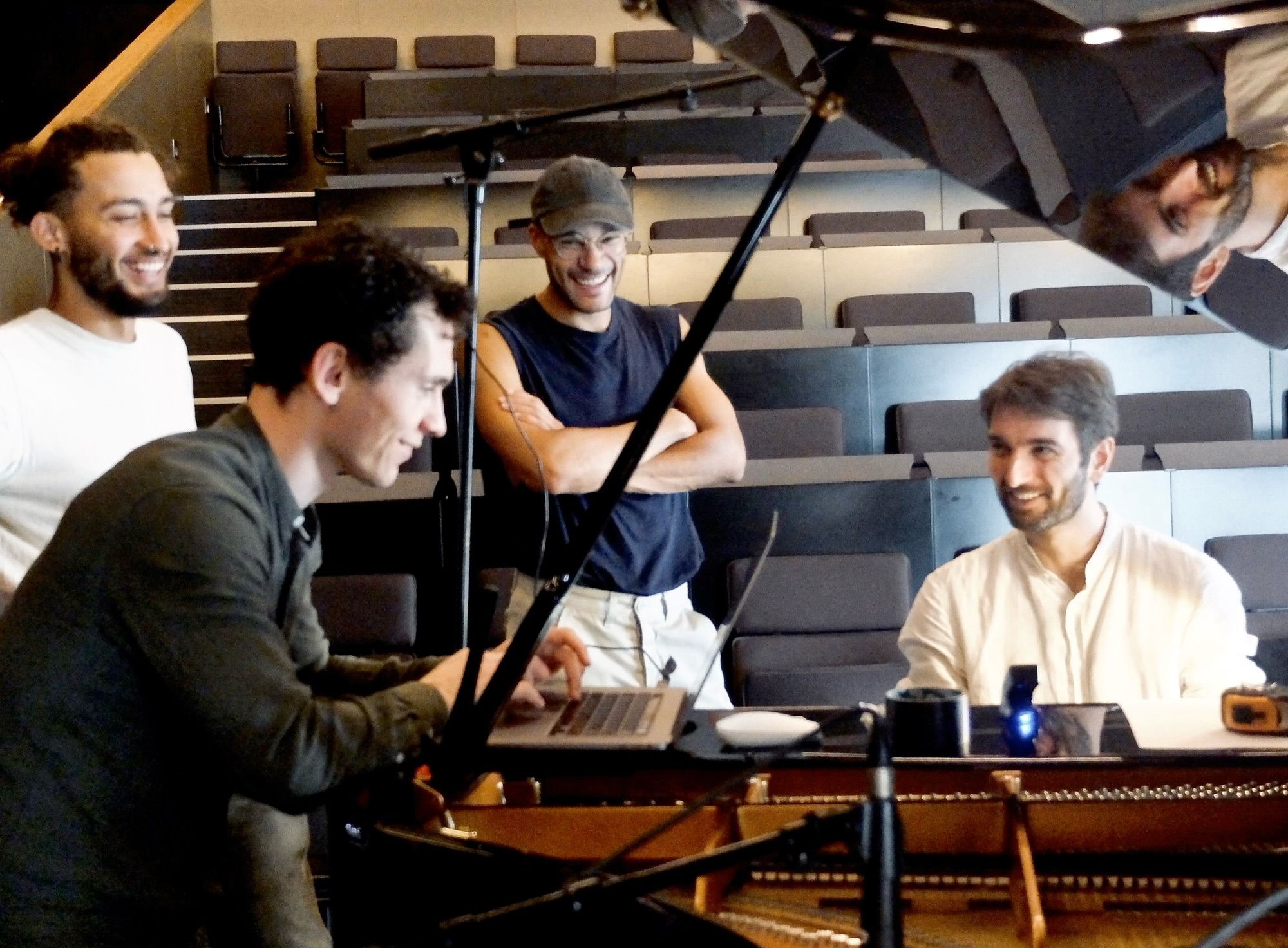 RAIVE Summer School — participants gathered around a presentation